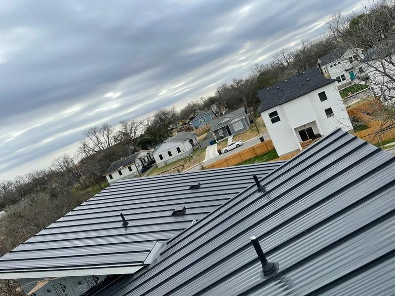 Standing seam metal roof panels with vents for Skylight Repair in Isanti